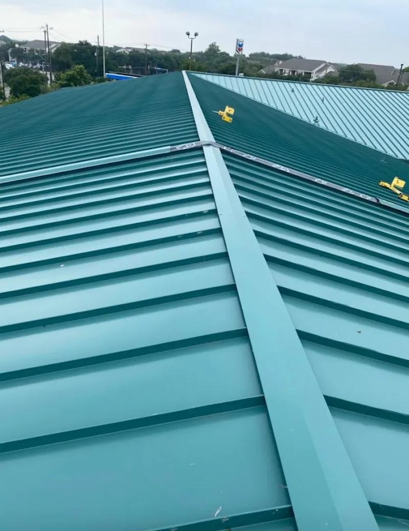 Green commercial metal roof ridge and valley for Metal Roof Repair in Waverly